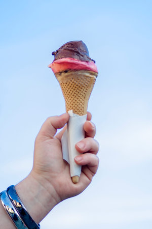 ice cream cone, fresh for your hot summer, with many delicious flavors, chocolate, pistachio, cream,...