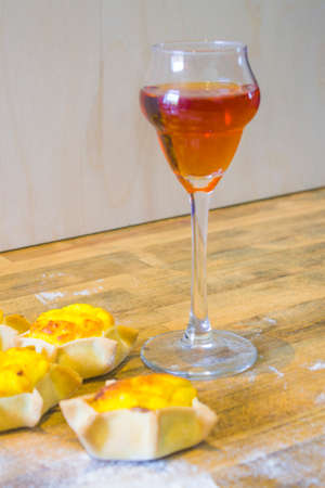 sweet wine with star-shaped sweets with shortcrust pastry, ricotta and creamの写真素材