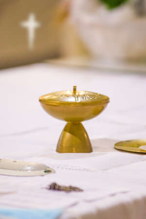 in the church wine becomes the blood of christ, and the host becomes the body of christの写真素材