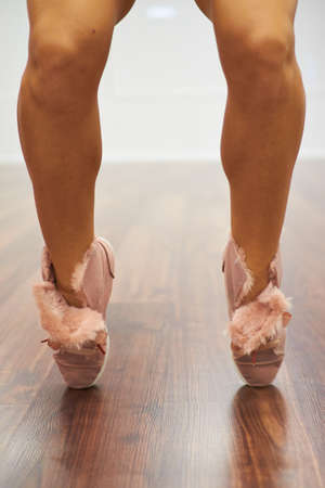 Close up of sport shoes in wood floorの写真素材