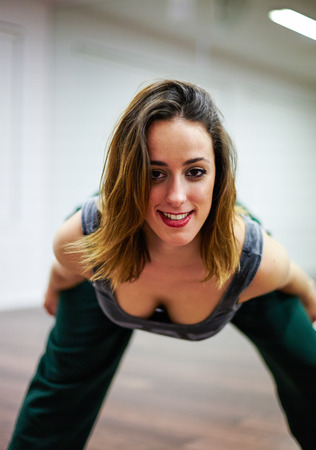 Sports girl posing on gym.の写真素材