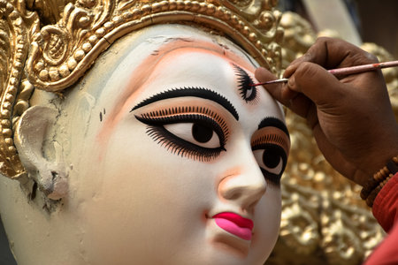Clay image making,Clay artist,painting eye, Goddess Durga ,Kumartuli,Clay image hub,Kolkata,India.