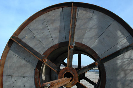 Abandoned giant spool used in the fishing industryの写真素材