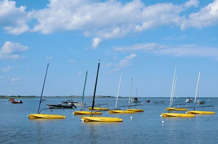 Boats in the Essex River, Essex, MA, on a clear summer  dayの写真素材