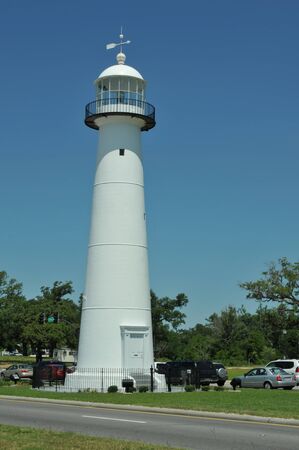 This lighthouse across from Biloxi Beach, Mississippi, withstood Hurricane Katrina in 2005.  It is the only lighthouse in the USA that is in the middle of a U.S. highway.の写真素材