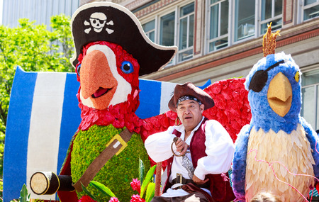 Portland, Oregon, USA - JUNE 7, 2014  Character Clown Corps in Grand floral parade through Portland...
