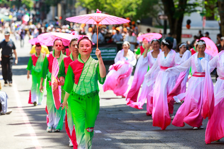 Portland, Oregon, USA - JUNE 7, 2014  Northwest Chinese Alliance in Grand floral parade through Portland downtown のeditorial素材