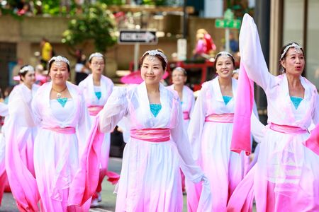 Portland, Oregon, USA - JUNE 7, 2014: Northwest Chinese Alliance in Grand floral parade through Portland downtown.のeditorial素材