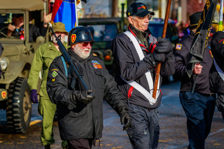 Portland, Oregon, USA - November 11, 2015: People march in the annual Ross Hollywood Chapel Veterans Day Parade, in northeast Portland.のeditorial素材