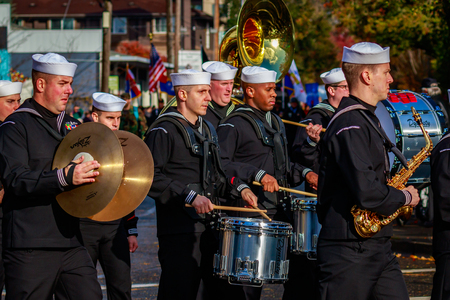 Portland, Oregon, USA - November 11, 2015: People march in the annual Ross Hollywood Chapel Veterans Day Parade, in northeast Portland.のeditorial素材