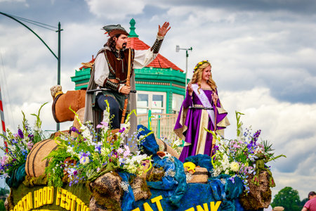 Portland, Oregon, USA - June 11, 2016: Sherwood Robin Hood Festival Mini-Float in the Grand Floral Parade during Portland Rose Festival 2016.のeditorial素材