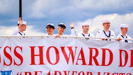 Portland, Oregon, USA - June 11, 2016: Crew Members of Rose Festival Fleet United States Navy in the Grand Floral Parade during Portland Rose Festival 2016.のeditorial素材