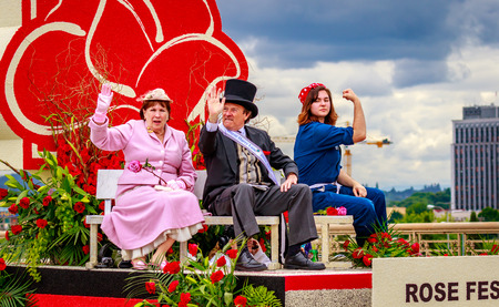 Portland, Oregon, USA - June 11, 2016: Portland Rose Festival Foundation Float featuring Living History Characters in the Grand Floral Parade during Portland Rose Festival 2016.のeditorial素材
