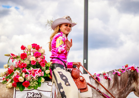 Portland, Oregon, USA - June 11, 2016: Miss NW Pro Rodeo Association, Beth Snider in the Grand Floral Parade during Portland Rose Festival 2016.のeditorial素材