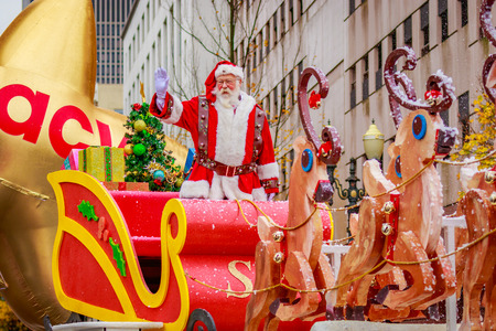 Portland, Oregon, USA - November 25, 2016: Santa Claus in the annual My Macy's holiday Parade across Portland Downtown.のeditorial素材