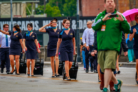 Portland, Oregon, USA - June 10, 2017: Alaska Airlines Drill Team in the Grand Floral Parade, as it stretched through the rain, during Portland Rose Festival 2017.のeditorial素材