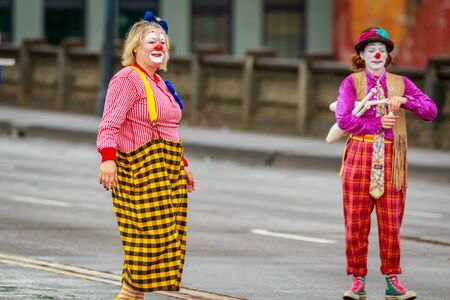 Portland, Oregon, USA - June 10, 2017: Rose Festival Circus Corps in the Grand Floral Parade, as it stretched through the rain, during Portland Rose Festival 2017.のeditorial素材