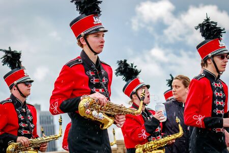Portland, Oregon, USA - June 10, 2017: Oregon City High School Marching Band in the Grand Floral Parade, as it stretched through the rain, during Portland Rose Festival 2017.のeditorial素材