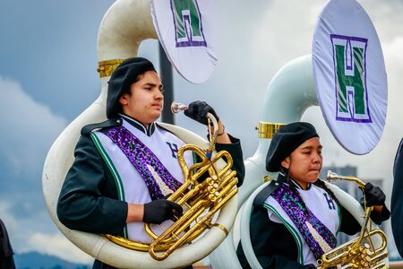 Portland, Oregon, USA - June 10, 2017: Heritage High School Marching Band in the Grand Floral Parade, as it stretched through the rain, during Portland Rose Festival 2017.のeditorial素材