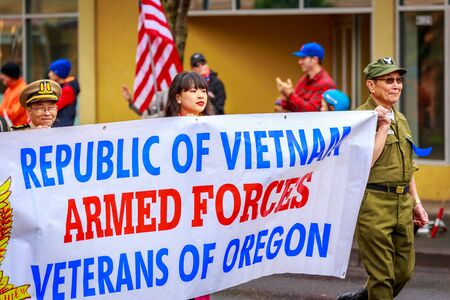 Portland, Oregon, USA - November 11, 2017: Vietnam Veterans of Oregon in the annual Ross Hollywood Chapel Veterans Day Parade, in northeast Portland.のeditorial素材