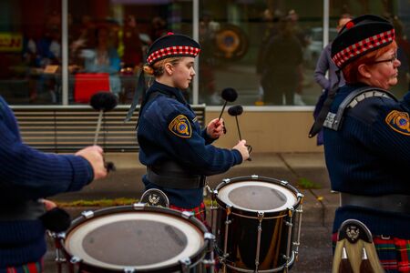 Portland, Oregon, USA - November 11, 2017: Portland Police Highland Guard Pipe Band in the annual Ross Hollywood Chapel Veterans Day Parade, in northeast Portland.のeditorial素材