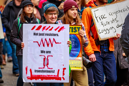 Portland, Oregon - April 14, 2018: People with signs at Portland March for Science.のeditorial素材