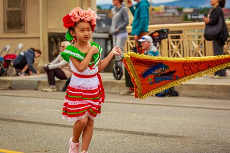 Portland, Oregon, USA - June 8, 2019: Comparsa Orgullo Morelense Cemiac in the Grand Floral Parade, during Portland Rose Festival 2019.のeditorial素材
