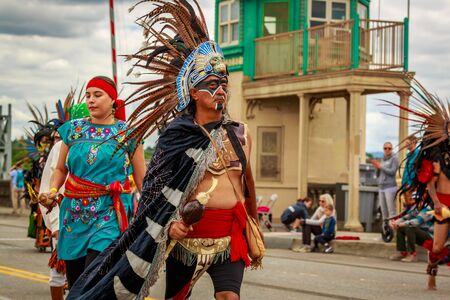 Portland, Oregon, USA - June 8, 2019: Aztec Dancers in the Grand Floral Parade, during Portland Rose Festival 2019.のeditorial素材