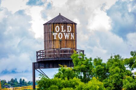 Iconic old town sign on water tank, in downtown Portland, Oregonの写真素材