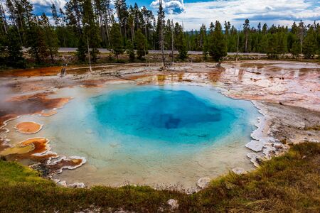 Silex Spring with hot clear blue water, in Lower Geyser Basin, Yellowstone National Parkの写真素材