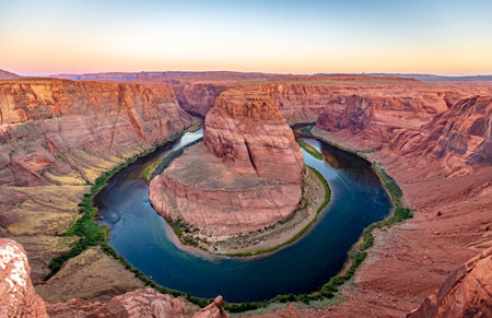 Scenic view over Colorado River at Horseshoe Bend, at dawn, in Page Arizonaの写真素材