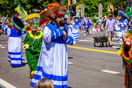 Portland, Oregon, USA - June 10, 2023:  Comparsa Orgullo Morelense Cemiac heritage group in the Grand Floral Parade, during Portland Rose Festival 2023.のeditorial素材