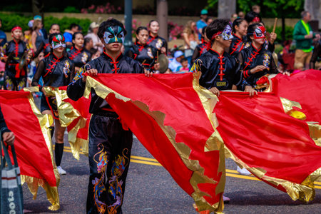 Portland, Oregon, USA - June 10, 2023: Shu-Te High School Marching Band in the Grand Floral Parade, during Portland Rose Festival 2023.のeditorial素材