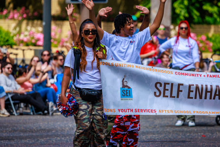 Portland, Oregon, USA - June 10, 2023: Self Enhancement, Inc. in the Grand Floral Parade, during Portland Rose Festival 2023.のeditorial素材