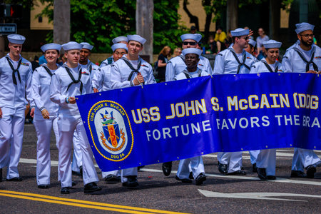Portland, Oregon, USA - June 10, 2023: USS John S. McCain (DDG-56) crew in the Grand Floral Parade, during Portland Rose Festival 2023.のeditorial素材