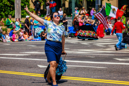 Portland, Oregon, USA - June 10, 2023: Alaska Airlines Drill Team in the Grand Floral Parade, during Portland Rose Festival 2023.のeditorial素材