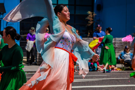 Portland, Oregon, USA - June 10, 2023: Northwest Chinese Alliance in the Grand Floral Parade, during Portland Rose Festival 2023.のeditorial素材