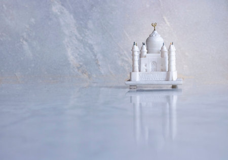 Marble made miniature Taj Mahal in Marble background with reflectionの写真素材