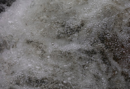 water bubbles in a running stream