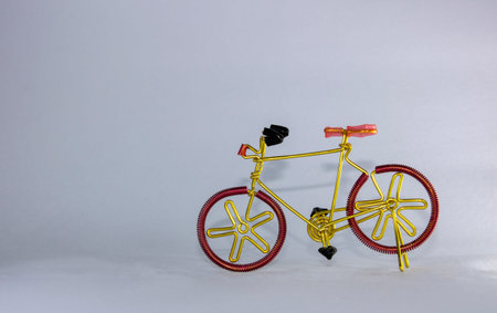 toy bicycle made out of metal wire, in white background