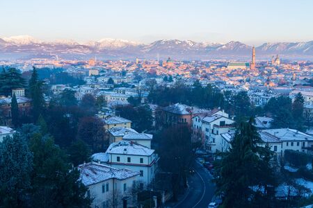Aerial view of the city of Vicenza in Italy at sunrise in a winter day. The city of Palladio, from the name of the architect who designed most of his works here in the late Renaissance.の写真素材