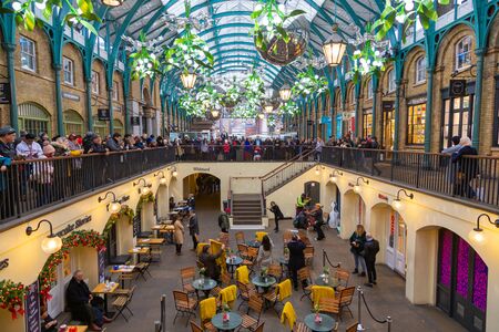 LONDON, UK - December 31, 2019: Covent Garden is one of the major tourist attraction places in London. Shops, pubs, restaurants and street artists make this area a must on any visit to Londonのeditorial素材
