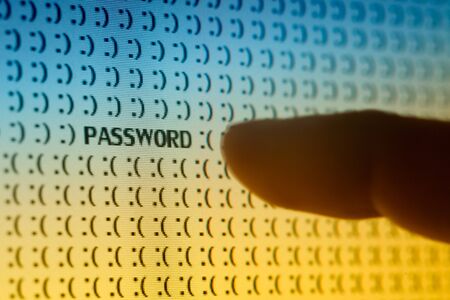 Macro computer screen shot with binary code and password tex, great concept for computer, technology  and online security.の写真素材