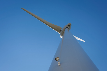 Wind Turbines on a modern windmill farm for alternative energy production.
Electricity is powered ecological and considered better for the environment over oil and other fossil fuels. A renewable resource for energy.の写真素材