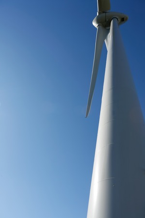 Wind Turbines on a modern windmill farm for alternative energy production.
Electricity is powered ecological and considered better for the environment over oil and other fossil fuels. A renewable resource for energy.の写真素材