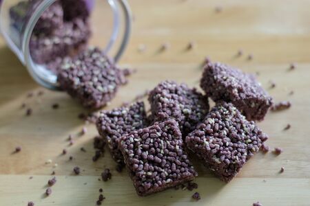 Crispy Riceberry Snack with white sesame seed on woodenの写真素材