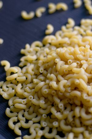 Macaroni on woodenの写真素材