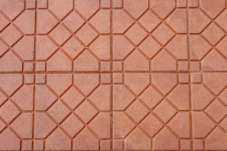 Red brick pavement texture. Abstract background for design with copy space.
