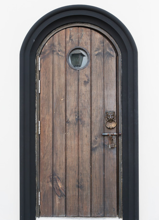 An old door's on the white background.の写真素材