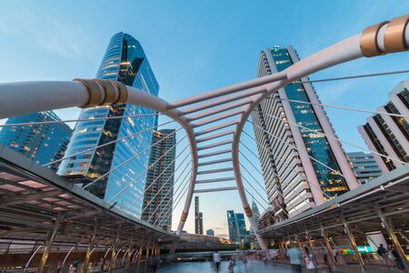 BANGKOK THAILAND  MAY 15: Sky bridge link landmark of bangkok at SathornNarathiwas intersection among the highrise buildings on May 15 2015 in Bangkok Thailand.のeditorial素材